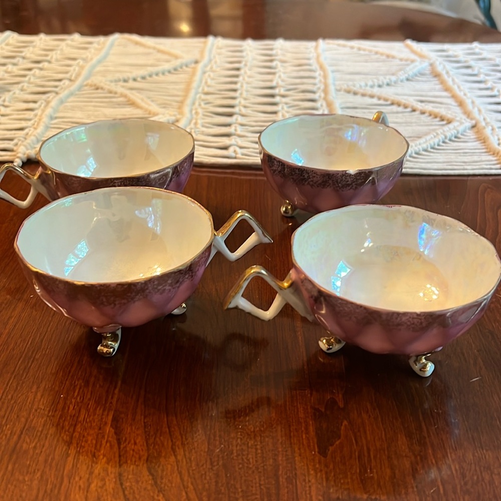 Vintage three footed tea cup
